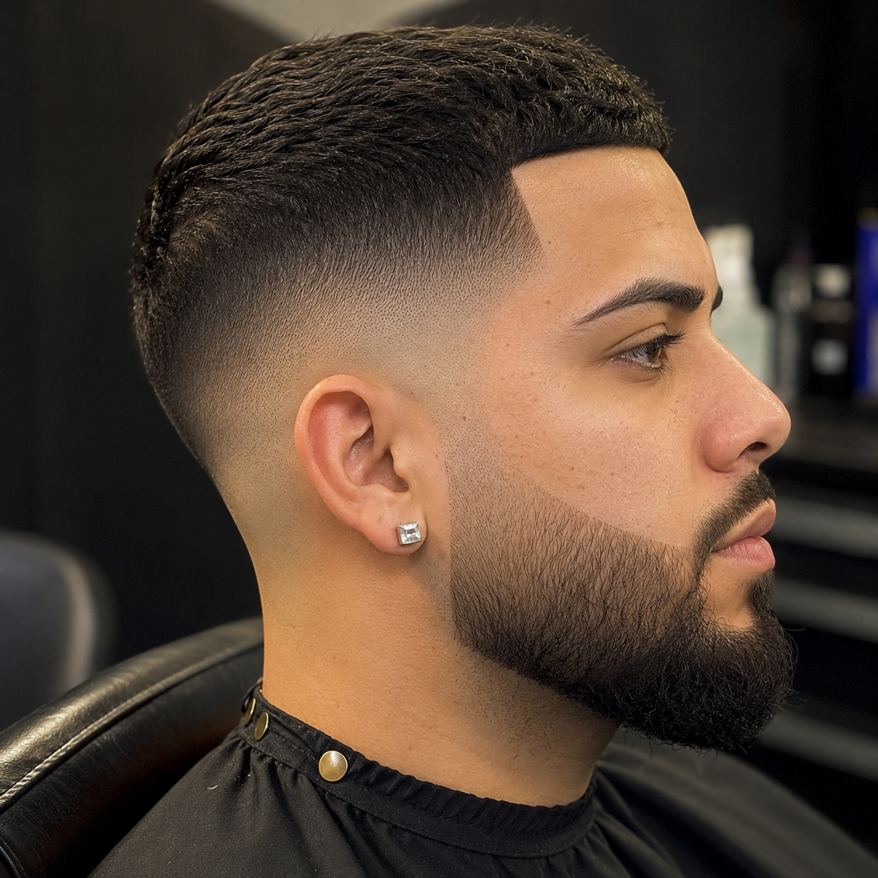 Skin fade, line up, beard sculpt.